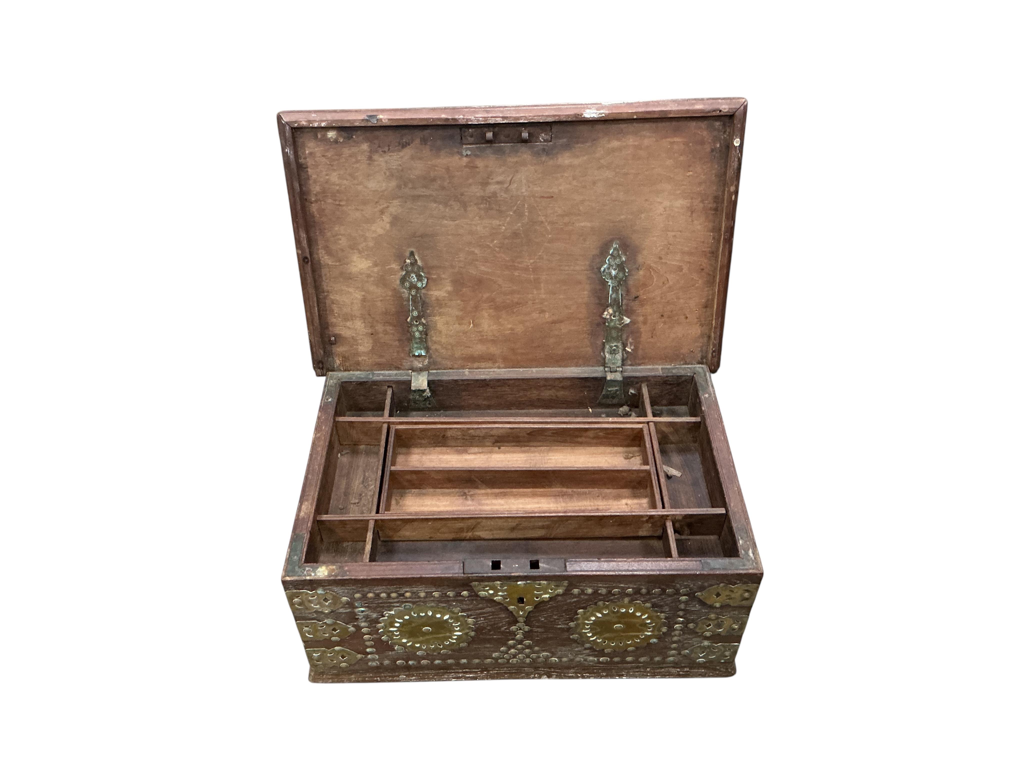 A Zanzibar type hardwood and brass studded box, width 57cm, depth 36cm, height 25cm